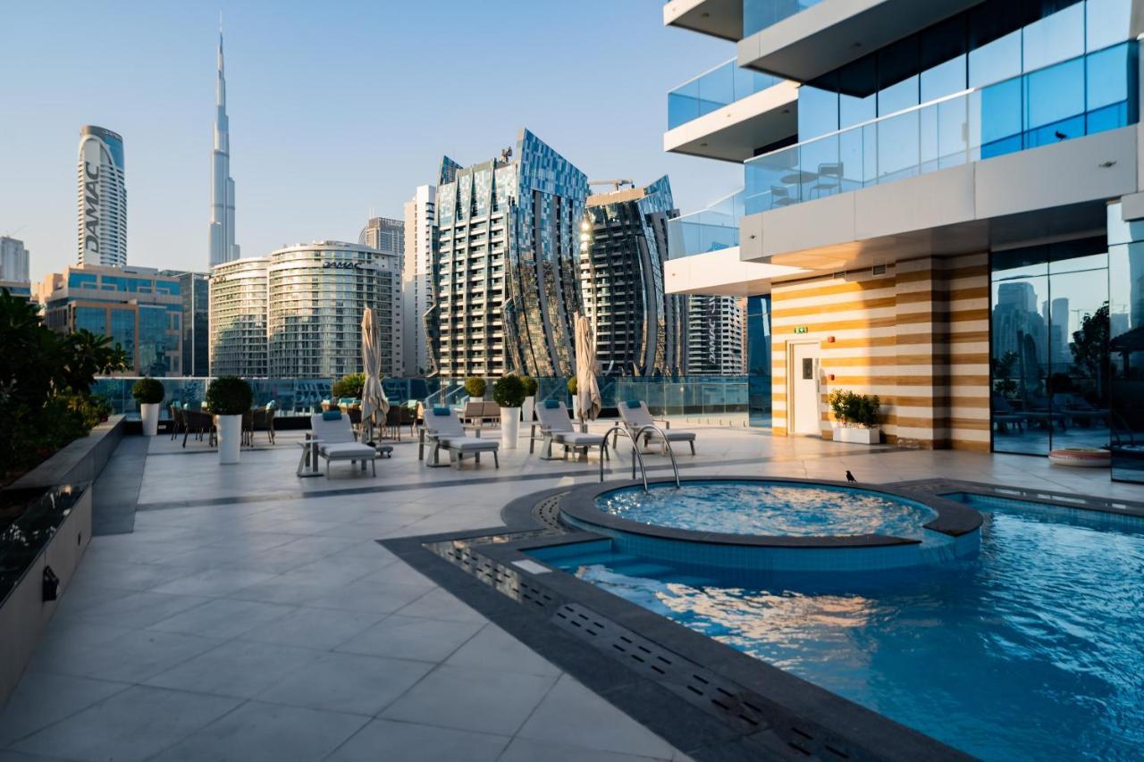 Exclusive Globalstay Apartments In Business Bay Free Parking & More! Дубай Экстерьер фото